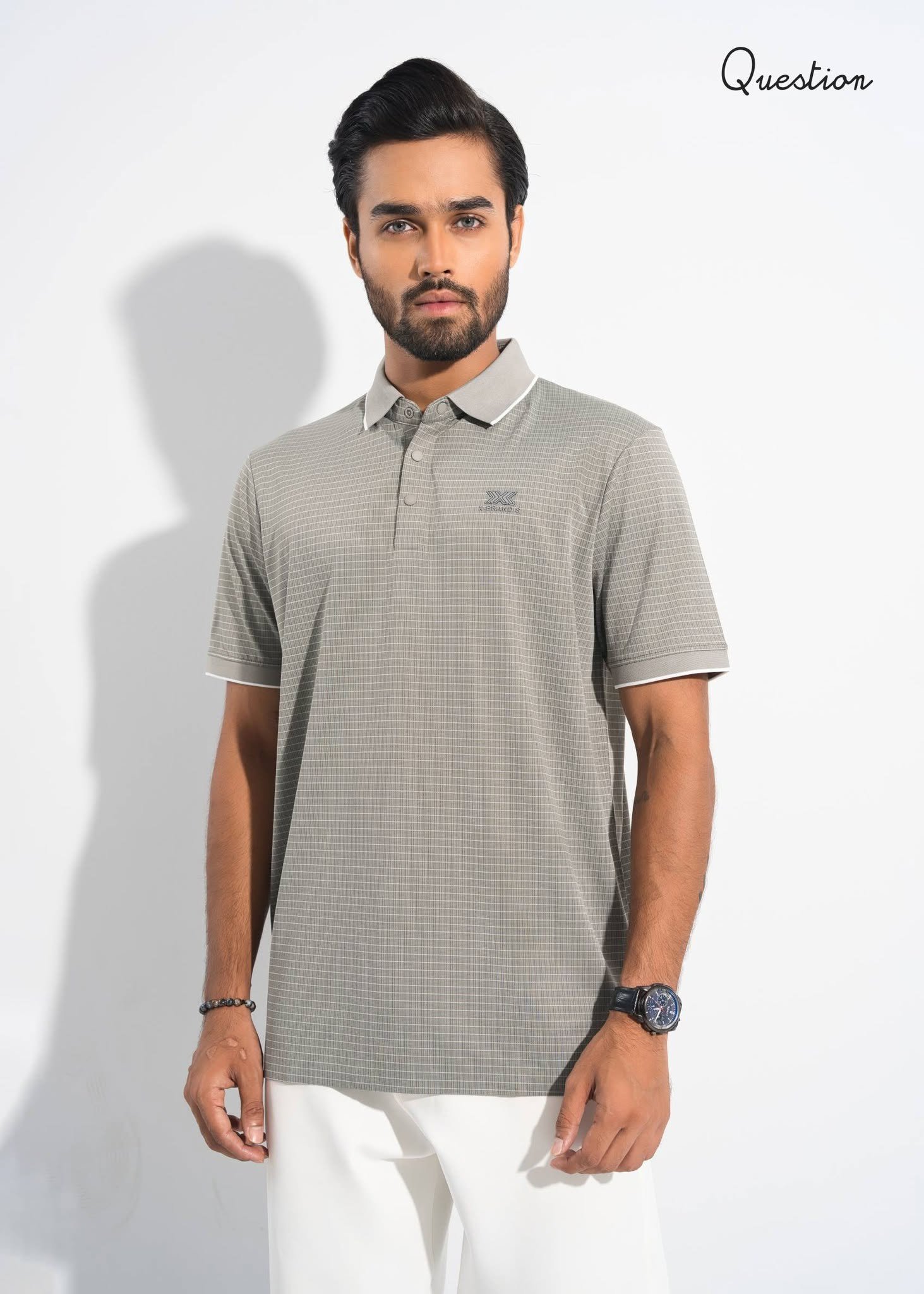 759776368_1376876614551245_1826200001611897445_n Question Premium Polo T-Shirt - Deep Off White - Image 1